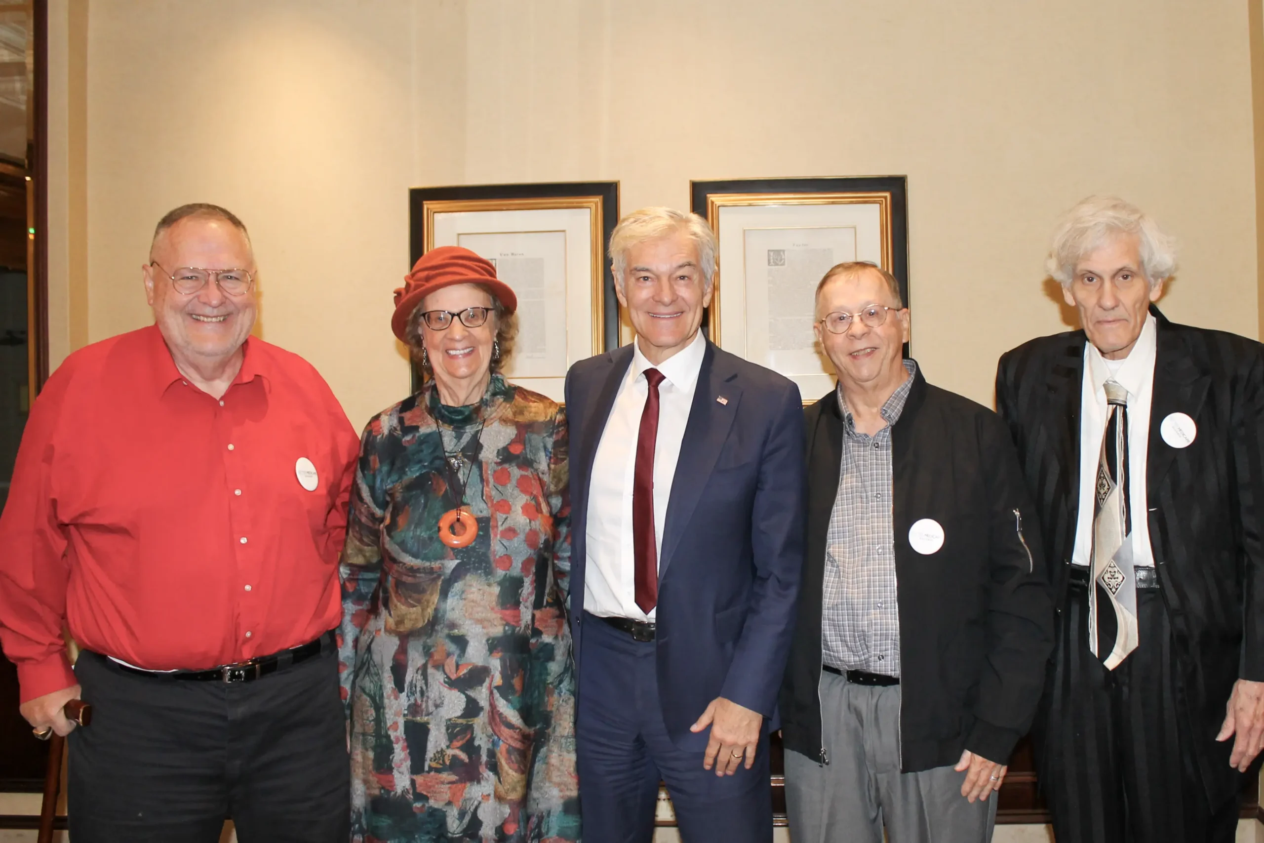 Group of seniors posing for a photo with Dr. Oz, CMS administrator